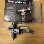 Olympia Tools 2-1/2" Table Vise #13-042 Clamp On, Box Damaged But Appears Unused. Fixed Price $16.97.