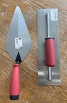 Marshalltown 11X4 7/8 Brick Trowel And 14X4 Finishing. Fixed Price $50.00.