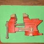 Olympia 3-1/2 In Jaw Width Red Swivel Base Cast Iron Bench Vise Mpn. Fixed Price $30.00.